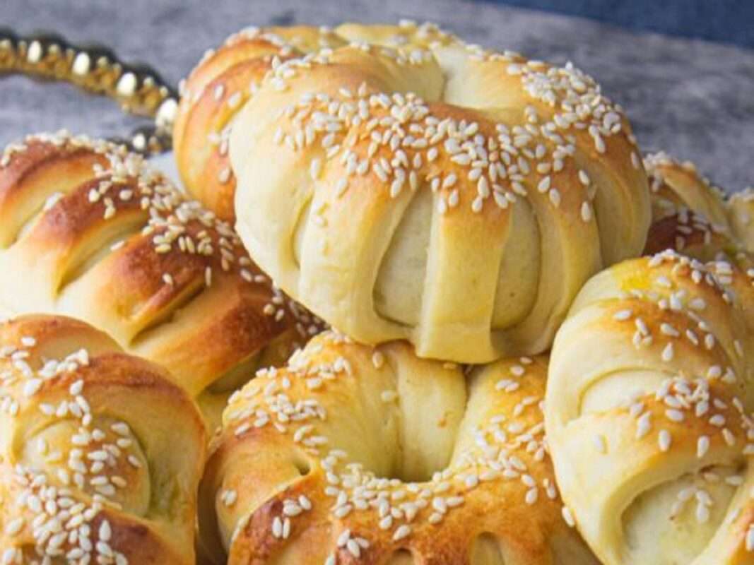 The golden buns of Brioche topped with a sprinkle of sesame