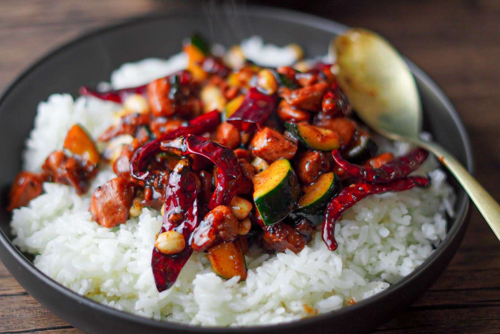 red peppers, zucchini, peanuts cooked with chicken and served over Jasmin rice