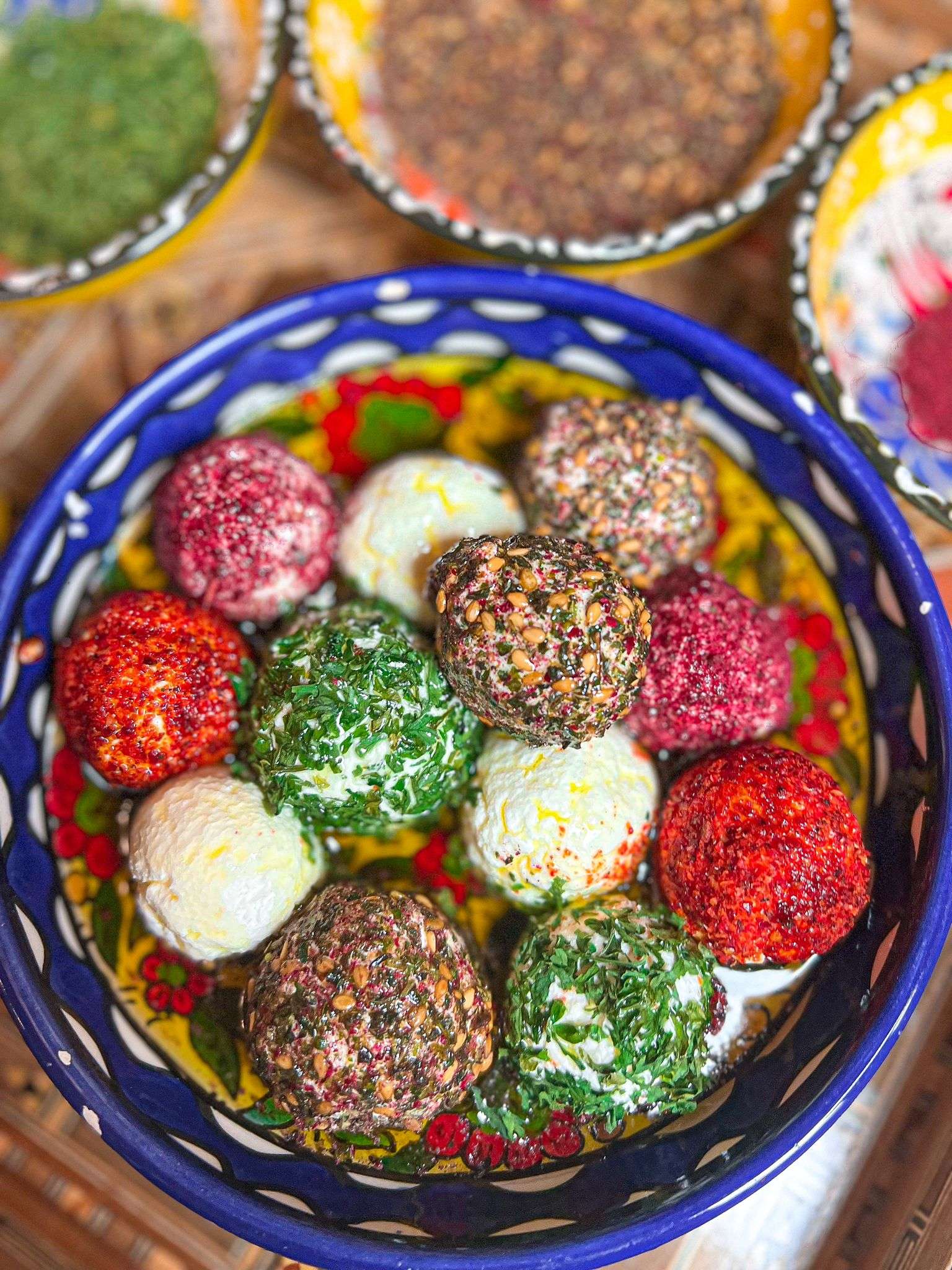 Authentic Labneh Balls coated in delicious earthy spices and herbs like zaatar, sumac, Aleppo pepper, and parsley