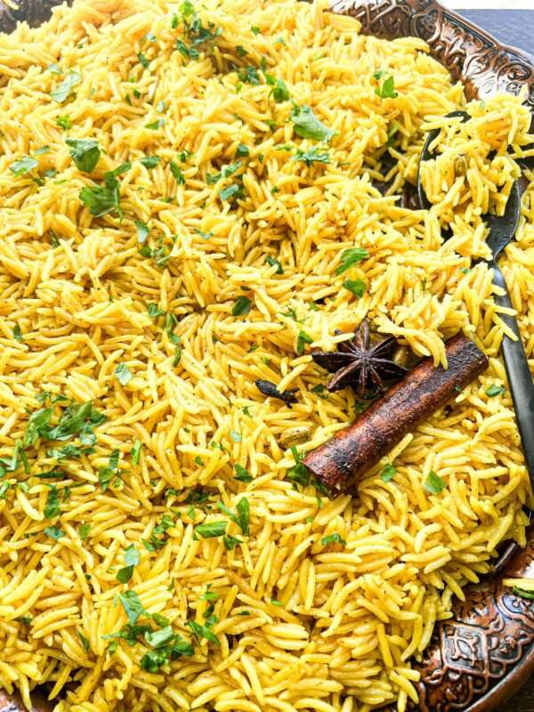 Aromatic Spiced Yellow Rice recipe makes the best out of basmati rice. Each grain is soft but not mushy. Perfect
