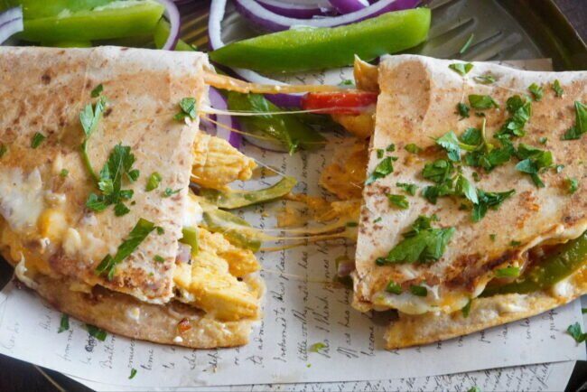 Crunchy chicken fajita with melted cheese.