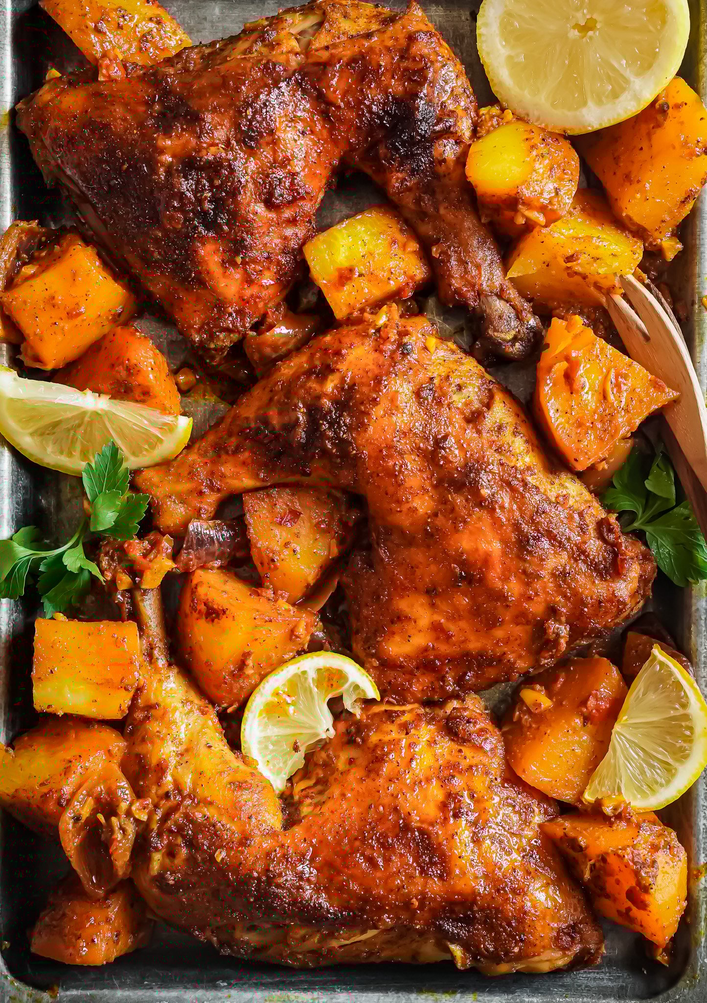Juicy baked chicken with crispy chicken cooked with yellow potatoes