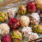 Great energy date balls covered with different flavors like pistachios, coconut, cranberries and sesame seeds.