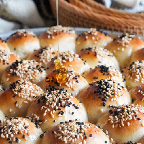 a drizzle of utterly divine honey of golden baked Honeycomb Bread topped with sesame and Nigella seeds