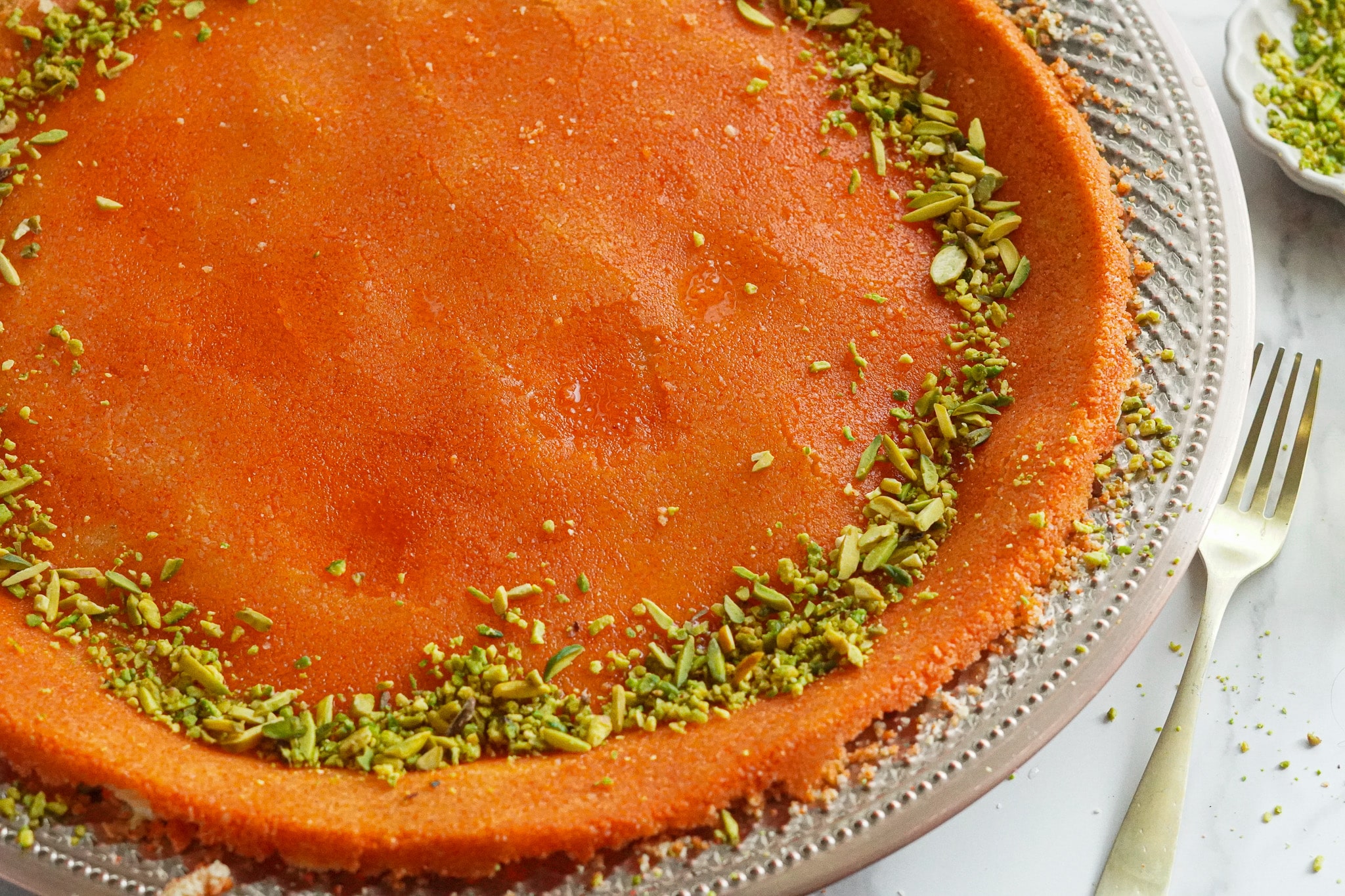 Palestinian knafeh na'ameh made with stretchy cheese, slightly crunchy dough, and simple syrup