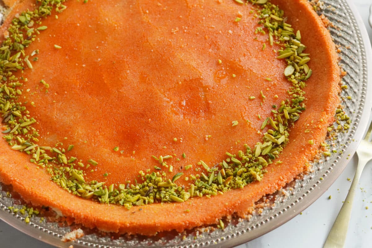 sweet and delicious homemade knafeh nabulsieh topped with crushed pistachios