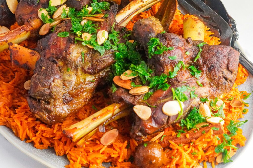 Yemeni Haneeth dish made of marinated lamb, served on top of rice.