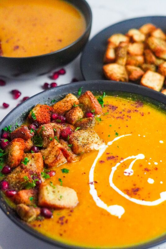 A warming Butternut Squash Soup for the cold chilly weather served with crunchy croutons