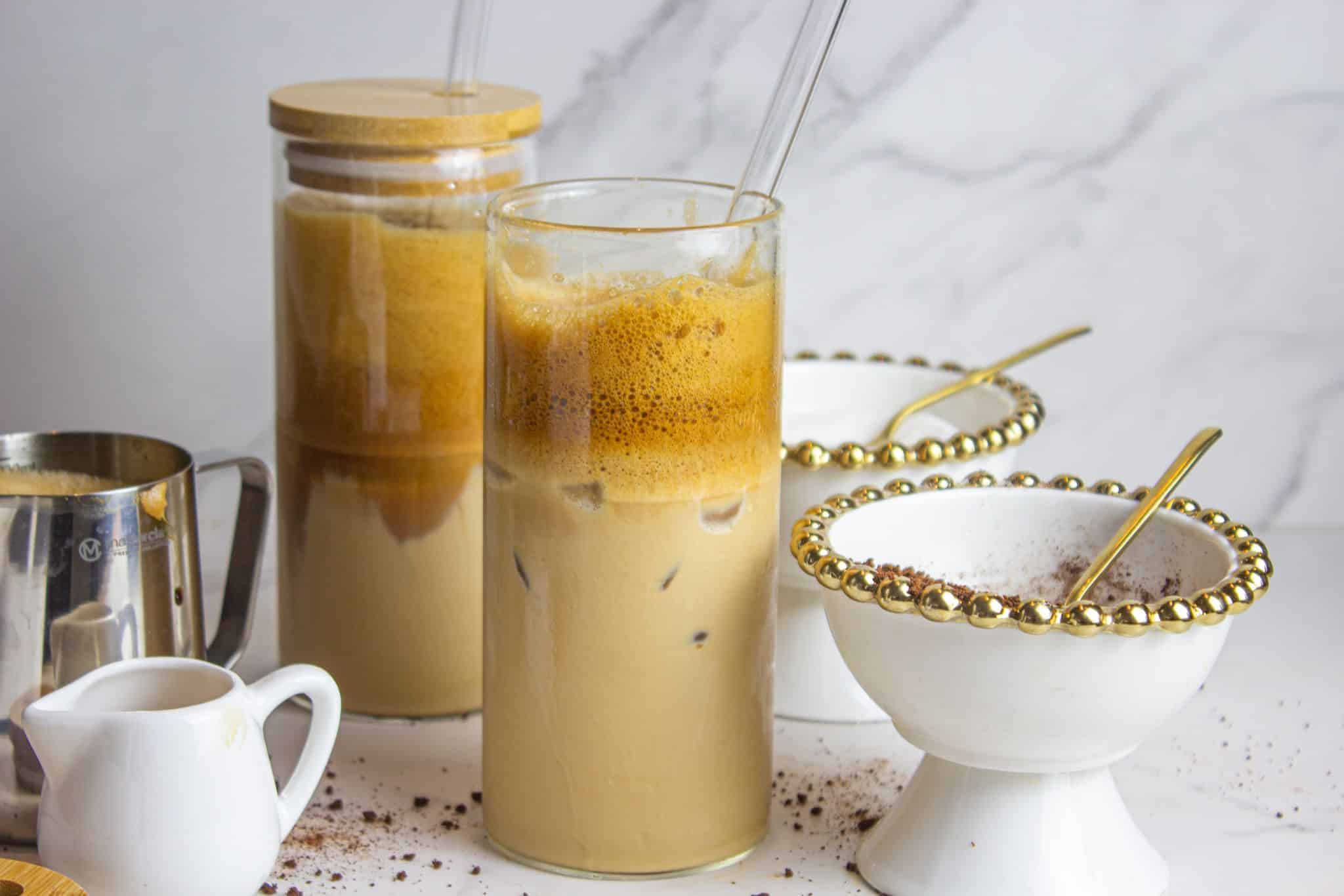 A refreshing glass of instant iced coffee and some flavored syrup for sweetness.