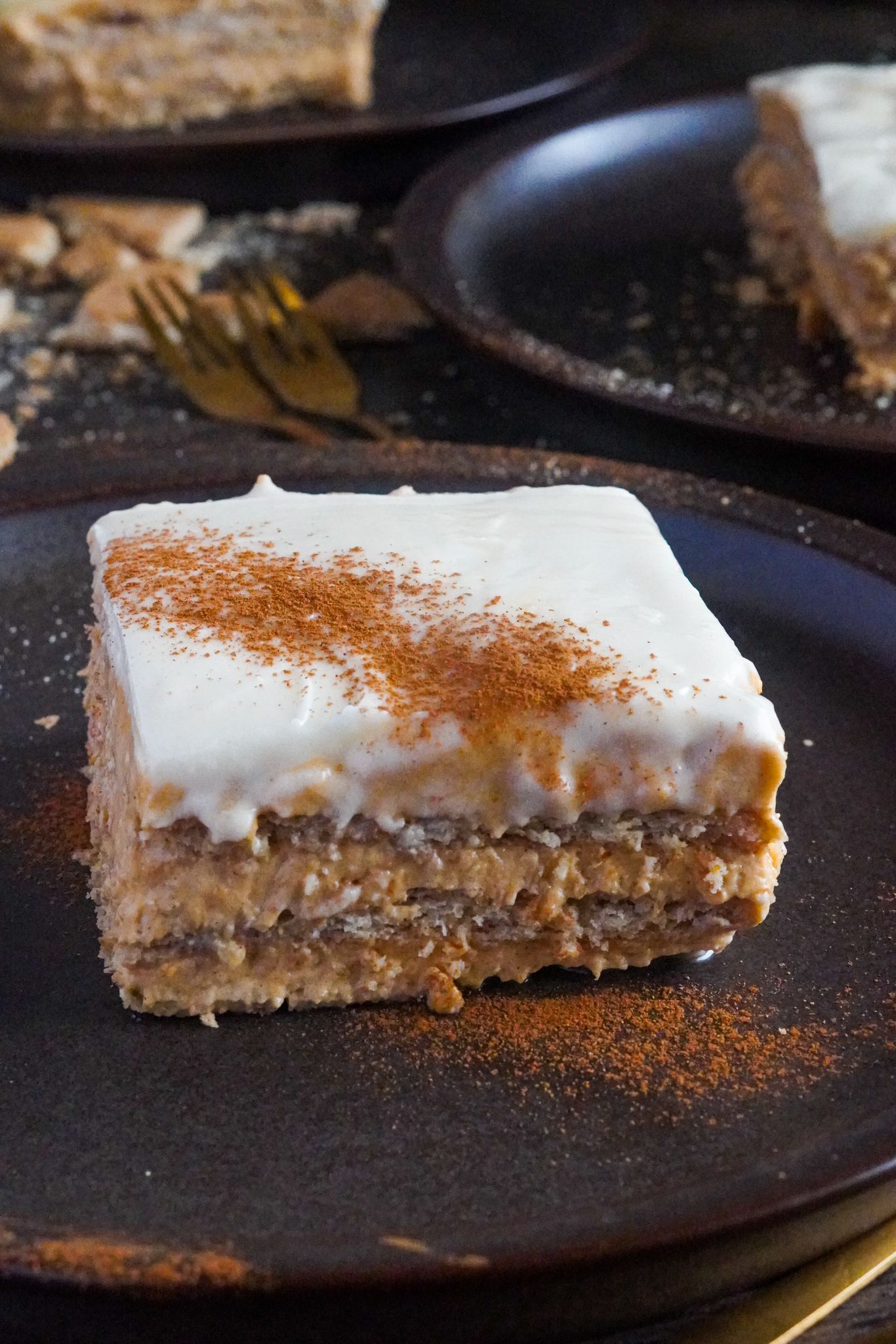 Pumpkin eclair cake featuring layers infused with the warm aroma of pumpkin pie spice