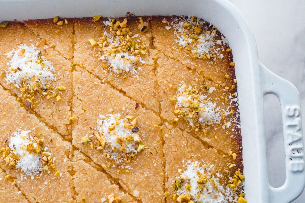 Basbousa, the dessert sensation with dessert lovers swooning, is a Middle Eastern masterpiece that weaves magic with semolina, sugar, and a touch of enchanting rosewater. 
