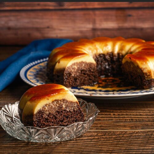 moist chocolate cake topped with a smooth creamy layer of flan, and a glossy caramel glaze