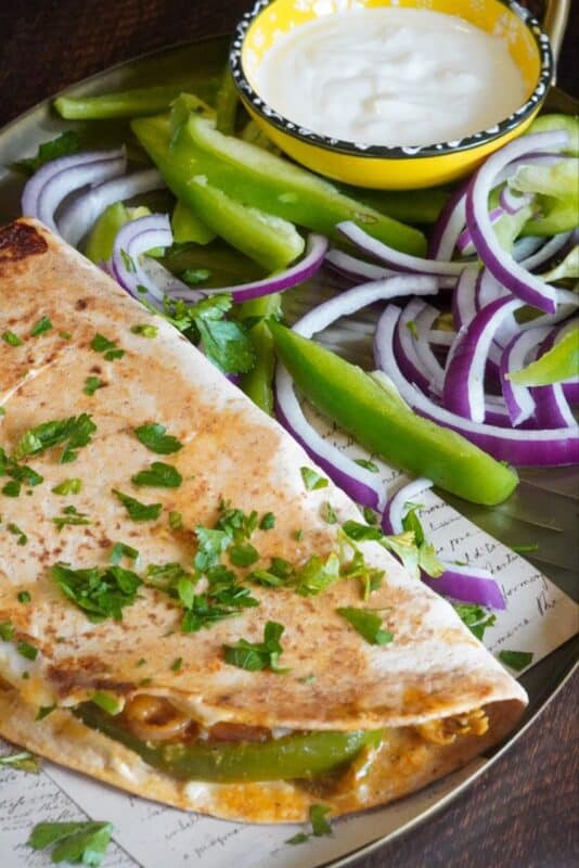 Mexican chicken fajita quesadillas made up with tender chicken pieces and a lot of creamy cheese that is to die for.
