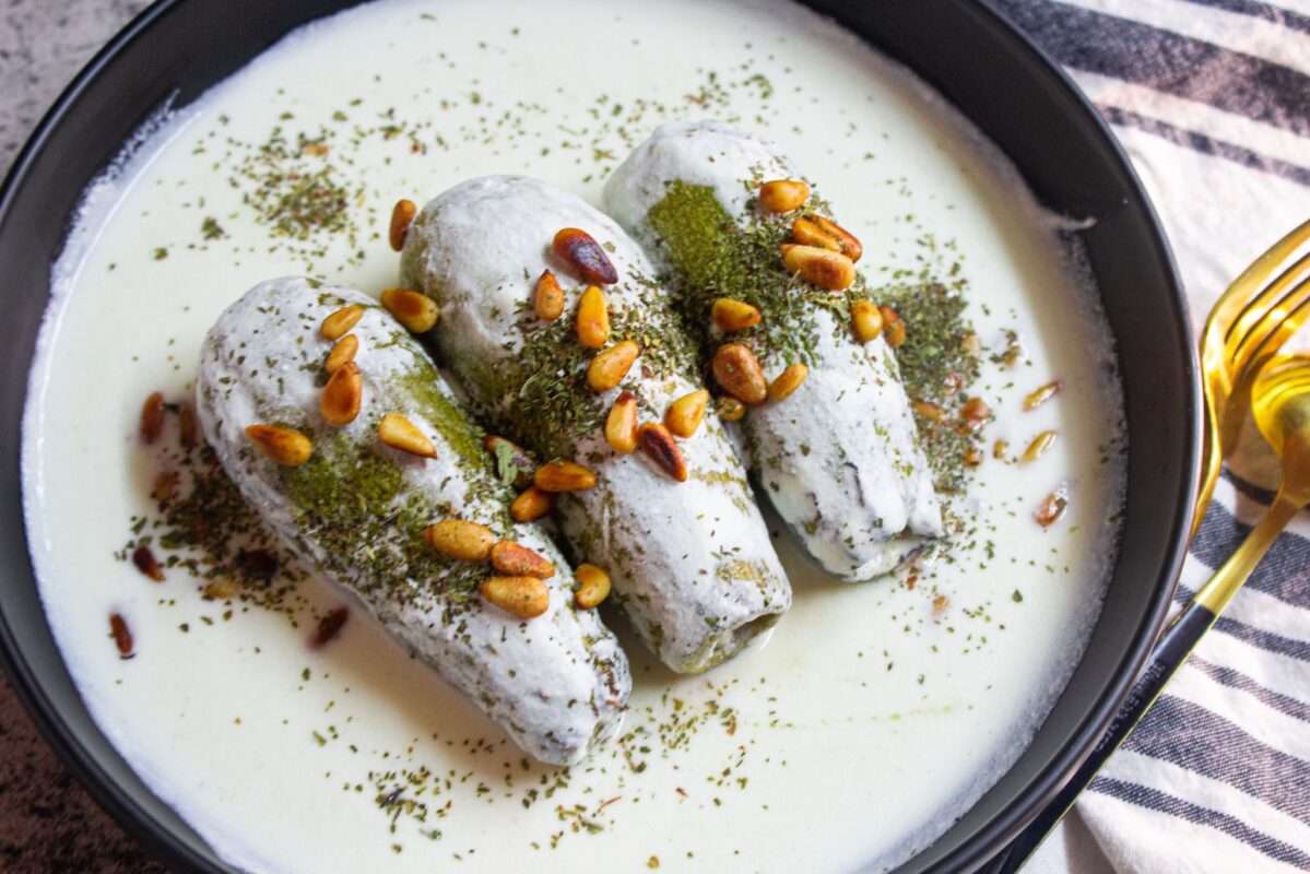 Sheikh Makhshi (Kusa Bi Laban) delicious zucchinis stuffed with grounded meat and dunked in garlic yogurt sauce!