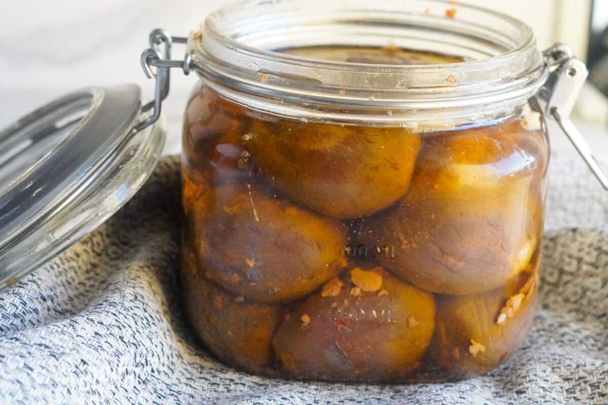 a jar of middle eastern stuffed eggplants pickles in olive oil